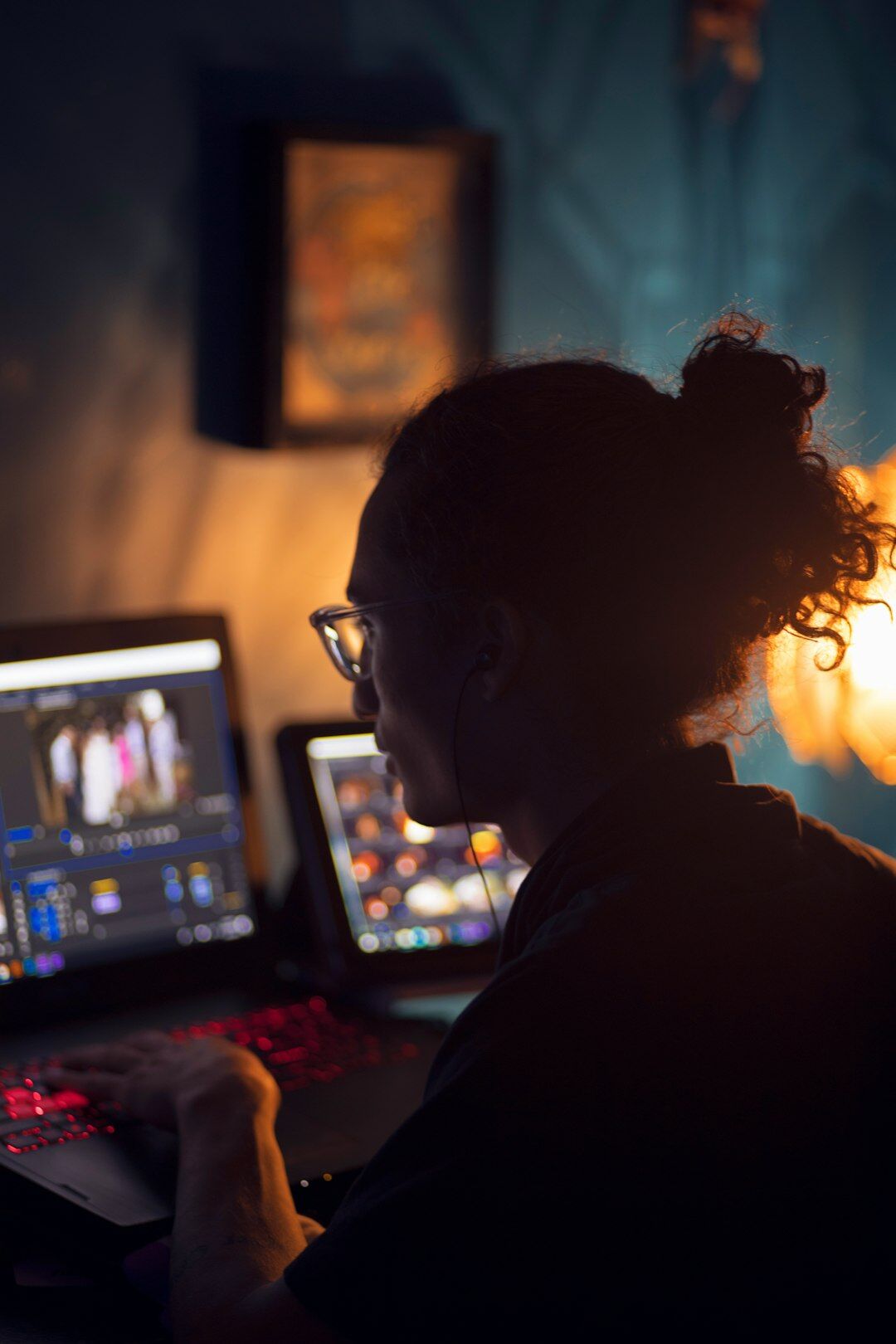 video editor working on computer